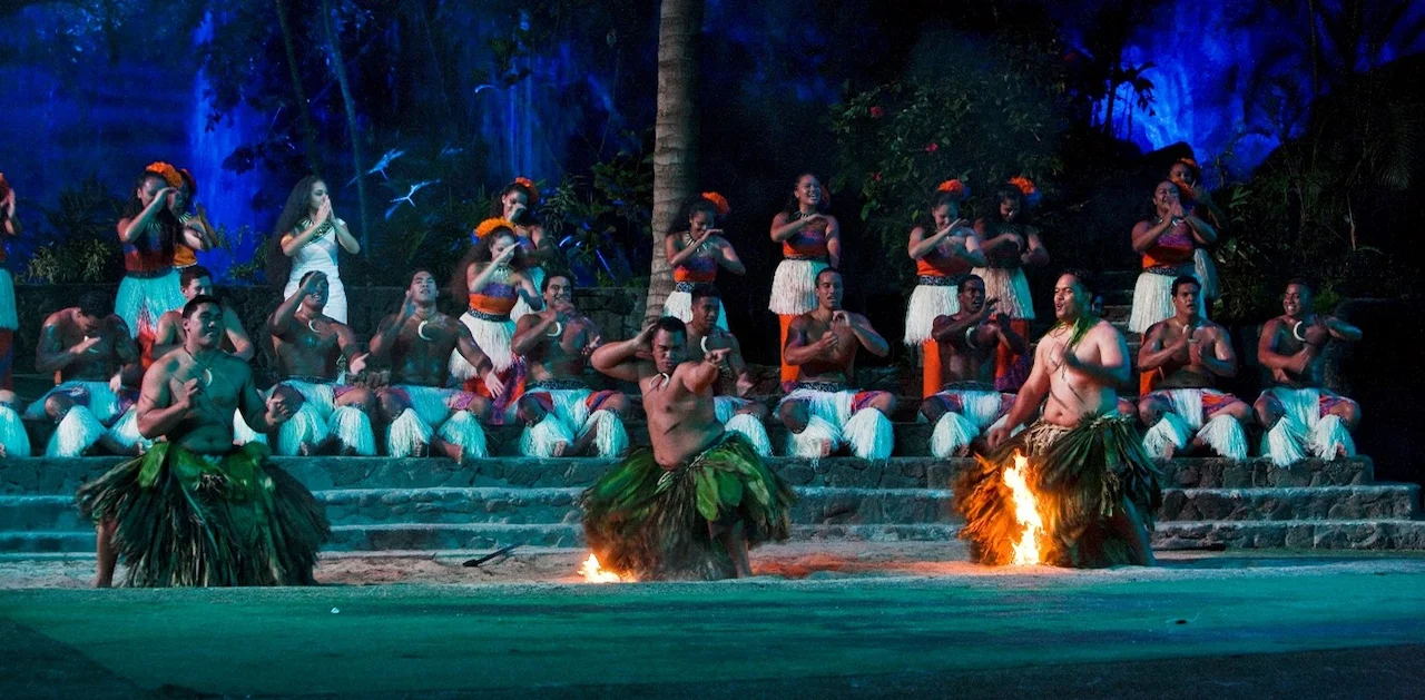 Firewalkers performing over flames during a scene inHā: Breath of Life.