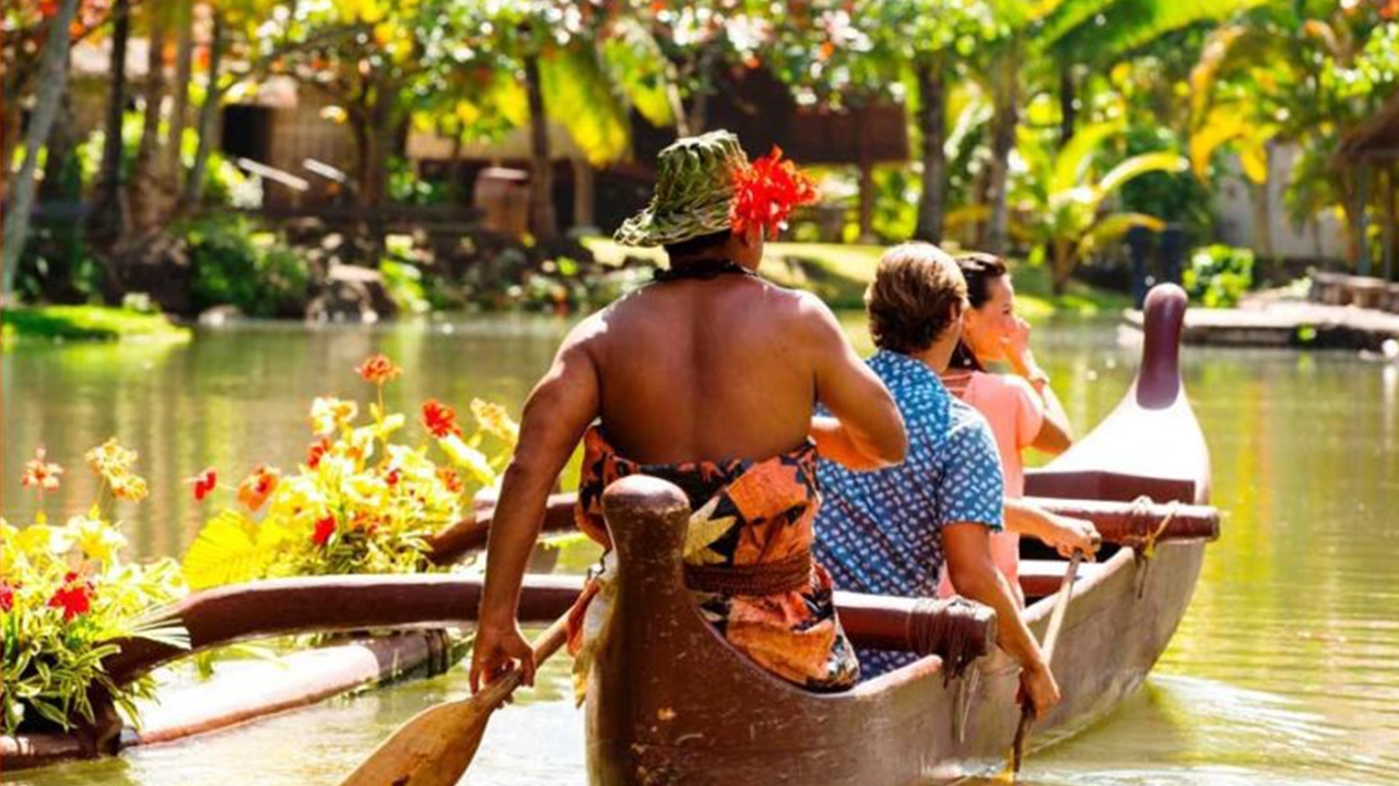 Guests participating in the private canoe tour at the Polynesian Cultural Center.