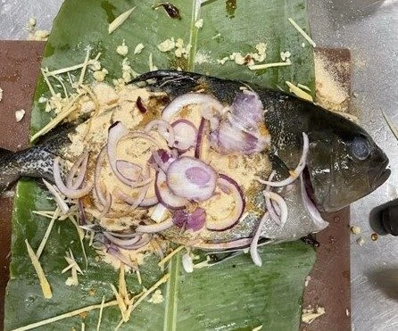 Kampachi fish cooked with all ingredients added.
