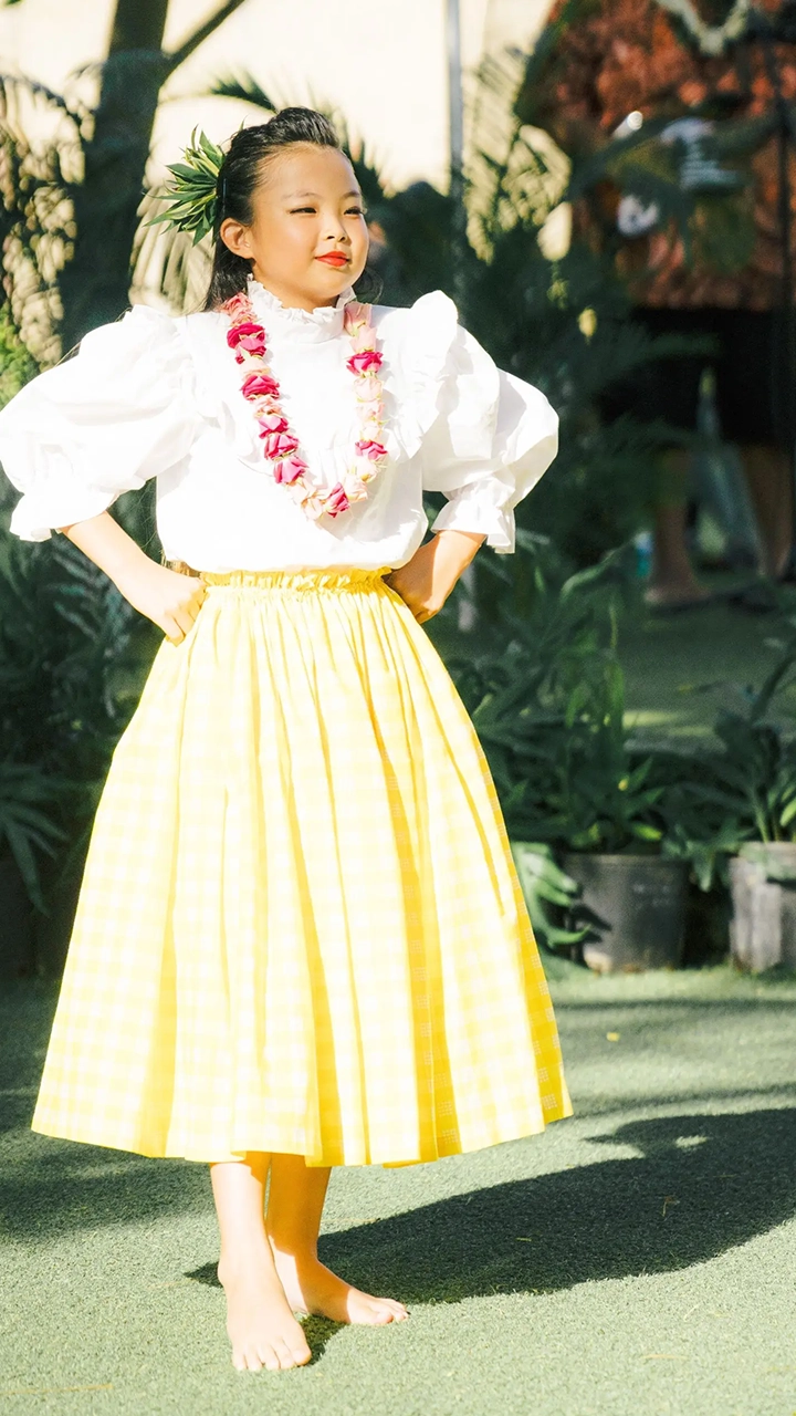 Young girl on stage and ready to perform.