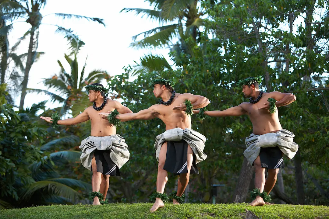 Men performing a traditional hula.
