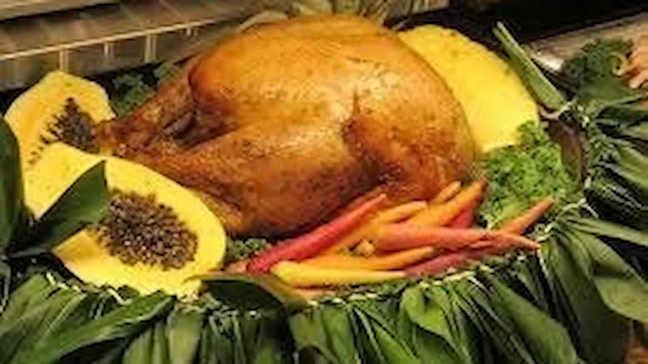 Whole turkey served along with local-style fruits and veggies.
