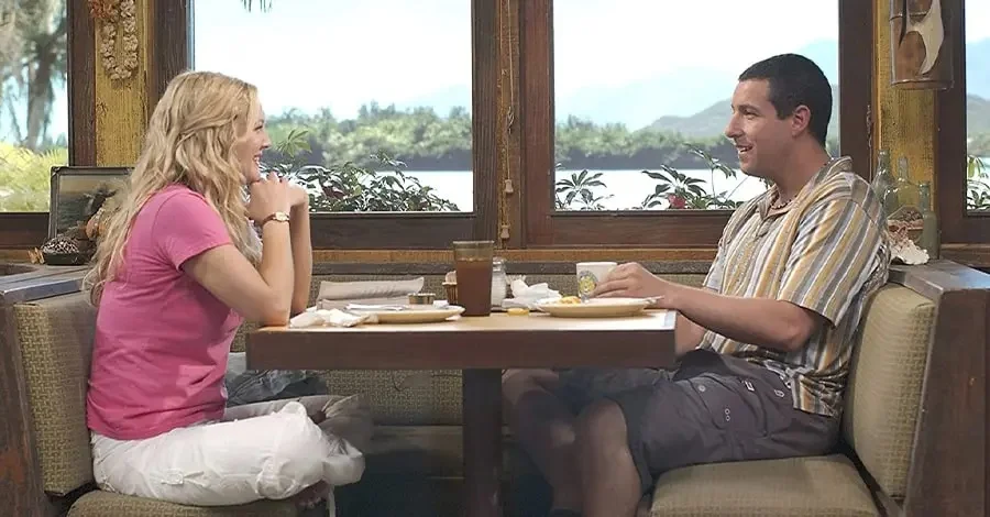 Drew Barrymore and Adam Sandler on a set for 50 First Dates based on the Hukilau Cafe.