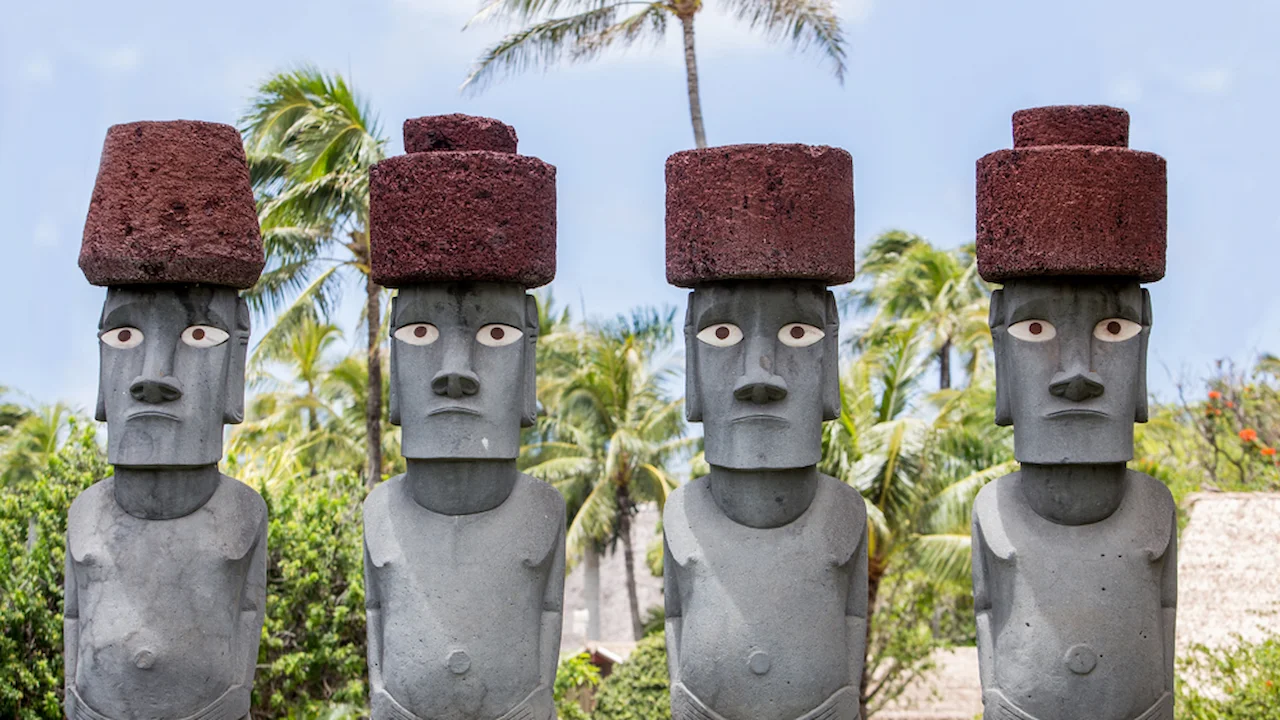 Four moai statues.